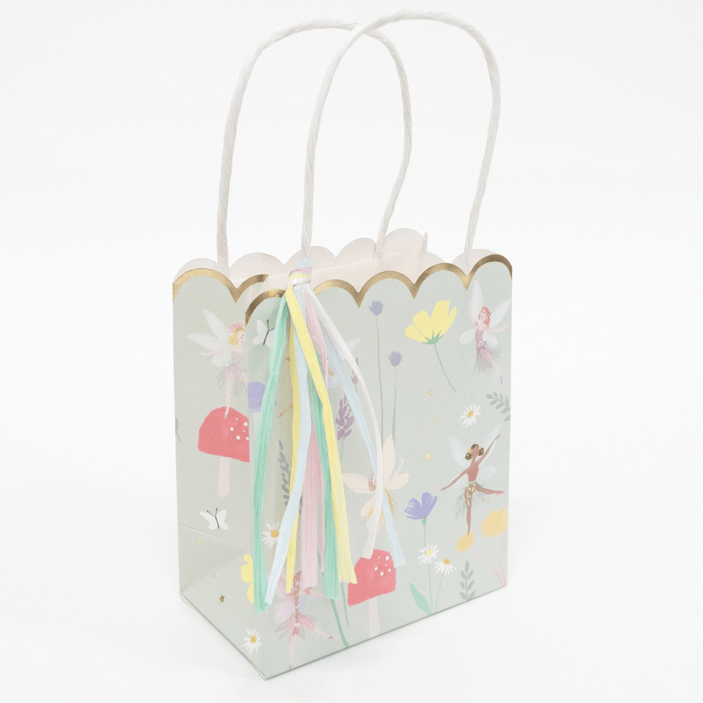 Pastel fairy gift bag with scalloped gold trim flowers and ribbon for birthday from Parte Haus party supply store in Bethesda Maryland