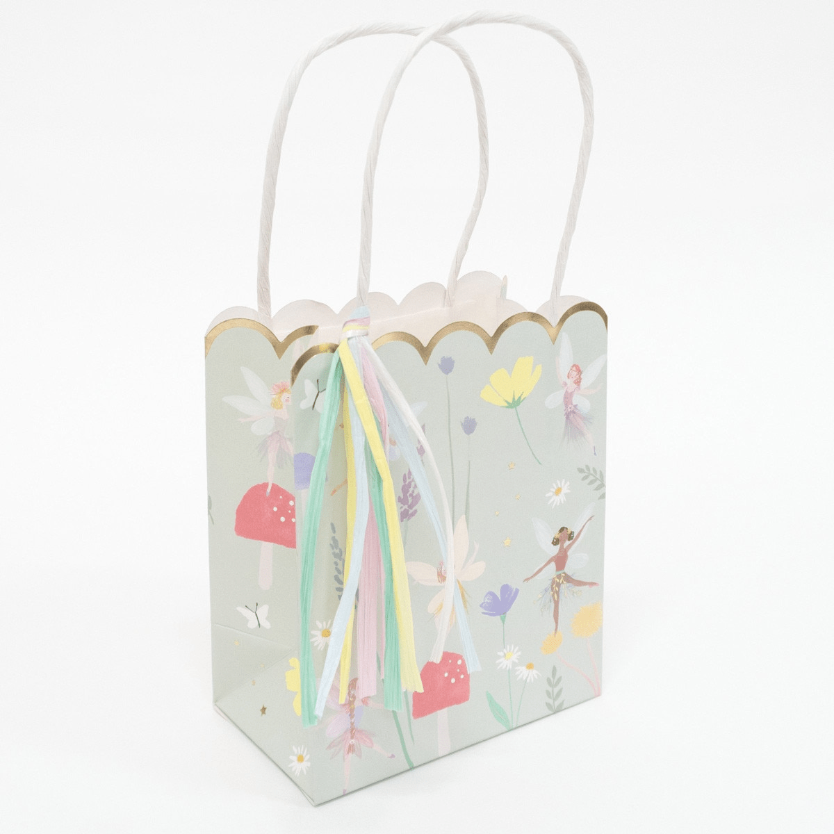 Pastel fairy gift bag with scalloped gold trim flowers and ribbon for birthday from Parte Haus party supply store in Bethesda Maryland