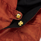 Red metallic fabric bag with gold snap closure for celebration from Parte Haus party supply store in Bethesda MD