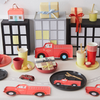 Red fire truck plates firefighter birthday table decor from Parte Haus party supply store in Bethesda Maryland