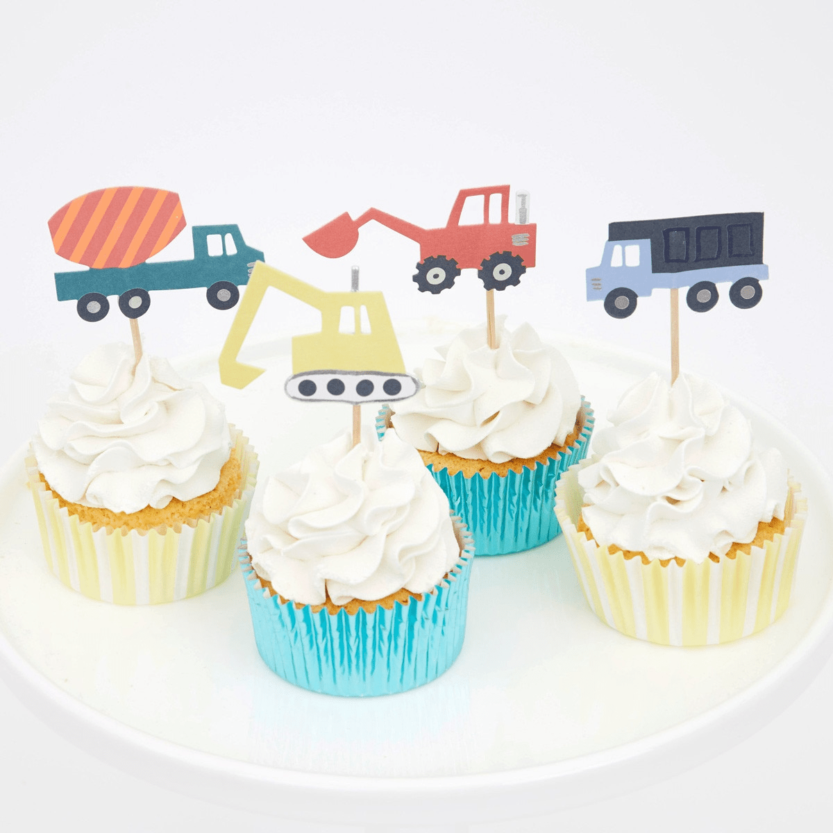 Multicolor construction vehicle cupcake toppers on cupcakes for birthday from Parte Haus party supply store in Bethesda MD