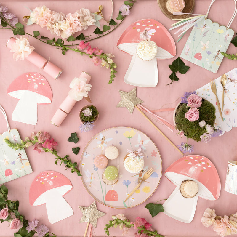 Pink fairy mushroom plates and floral party decorations fairy theme from Parte Haus party supply store in Bethesda Maryland