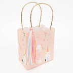 Pink unicorn gift bag with rainbows and castle design for birthday from Parte Haus party supply store in Bethesda MD