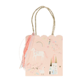 Pastel pink unicorn gift bag with castle and rainbow design fairy tale theme from Parte Haus party supply store in Bethesda MD