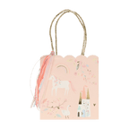 Pastel pink unicorn gift bag with castle and rainbow design fairy tale theme from Parte Haus party supply store in Bethesda MD