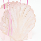 Pink seashell gift bag with gold accents and pink handles mermaid theme from Parte Haus party supply store in Bethesda MD