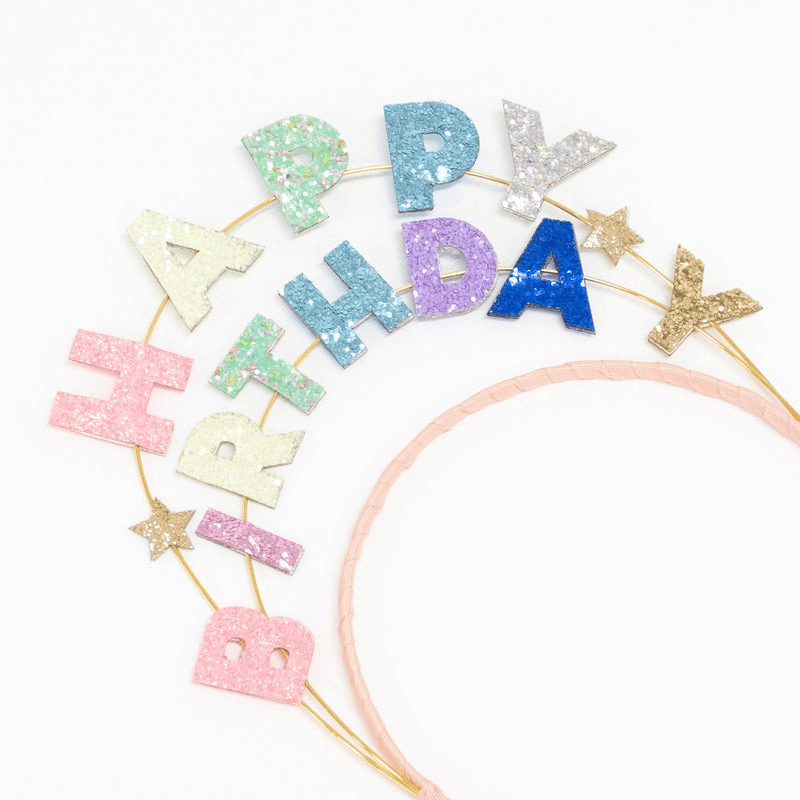 Multicolor glitter birthday headband for birthday party from Parte Haus party supply store in Bethesda Maryland