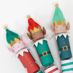 Green and red elf Christmas crackers with smiling faces for holiday decor from Parte Haus party supply store in Bethesda MD