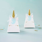 White unicorn favor boxes with gold horns for birthday from Parte Haus party supply store in Bethesda MD