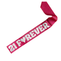 Pink glitter birthday sash with white 21 Forever lettering from Parte Haus party supply store in Bethesda MD