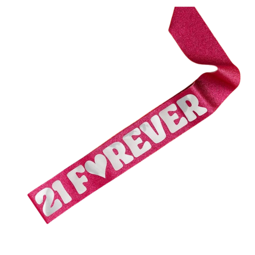 Pink glitter birthday sash with white 21 Forever lettering from Parte Haus party supply store in Bethesda MD