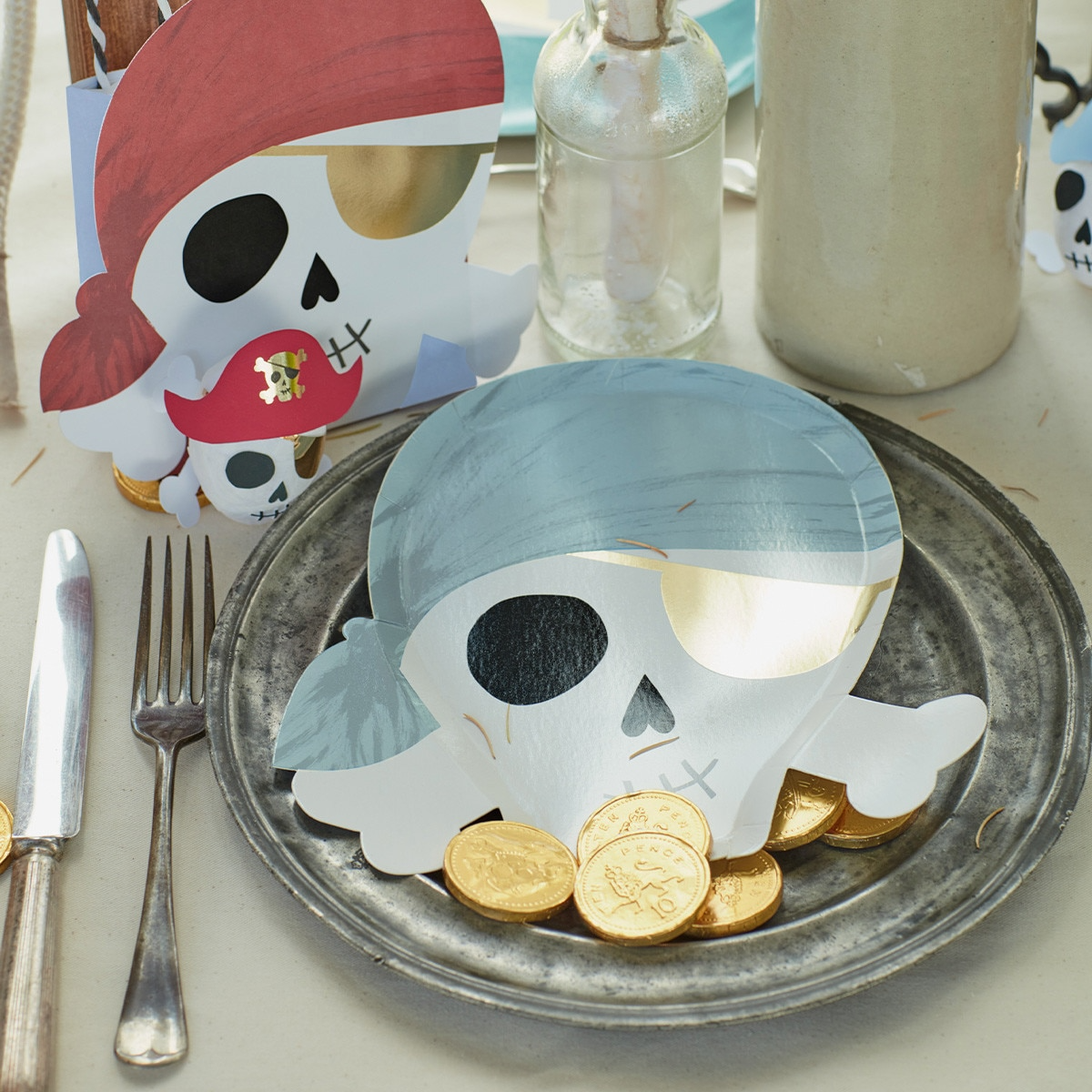Blue pirate skull paper plates for kid birthday from Parte Haus party supply store in Bethesda Maryland