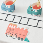 Red and blue train napkins and cups kids birthday theme from Parte Haus party supply store in Bethesda MD