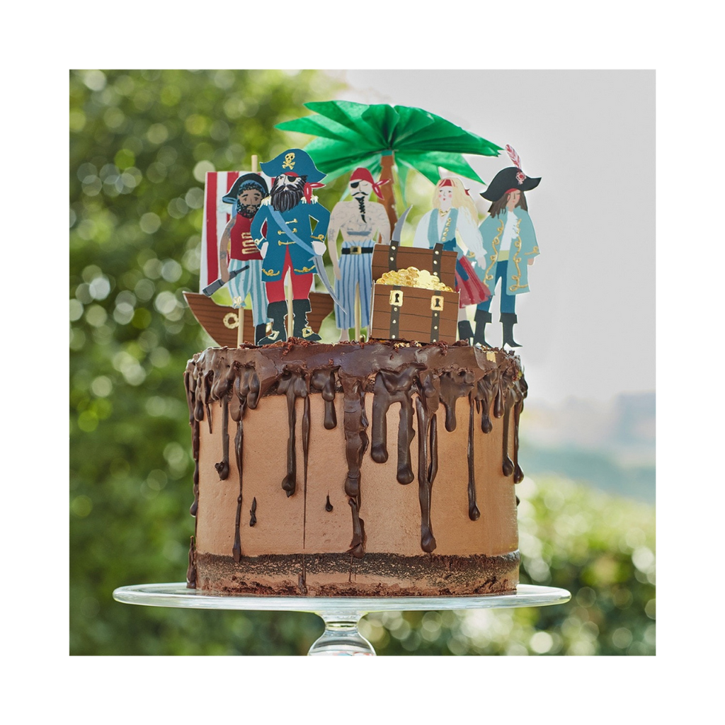 Multi-color pirate cake decoration topper with treasure chest and palm tree for birthday from Parte Haus party supply store in Bethesda MD