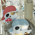 Blue and red pirate skull plates and loot bags for birthday from Parte Haus party supply store in Bethesda Maryland