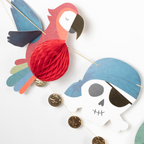 Colorful pirate garland with red parrot and blue skull for kids birthday from Parte Haus party supply store in Bethesda MD