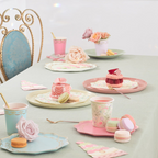 Pastel tea party table with macarons and floral plates for birthday from Parte Haus party supply store in Bethesda Maryland