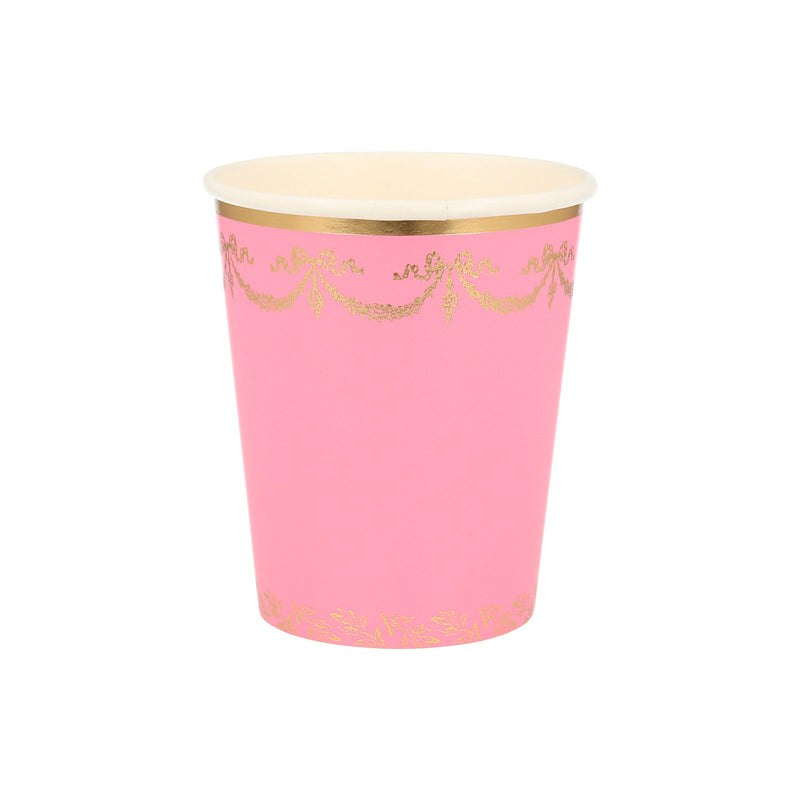 Pink paper cup with gold trim and bow design birthday theme from Parte Haus party supply store in Bethesda MD.