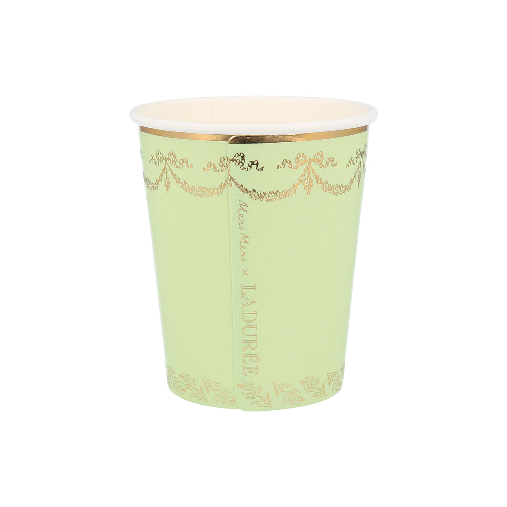 Light green paper cup with gold foil trim elegant design for tea party theme from Parte Haus party supply store in Bethesda MD