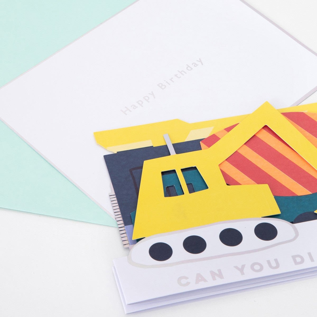 Yellow construction truck pop up birthday card for kids from Parte Haus party supply store in Bethesda Maryland