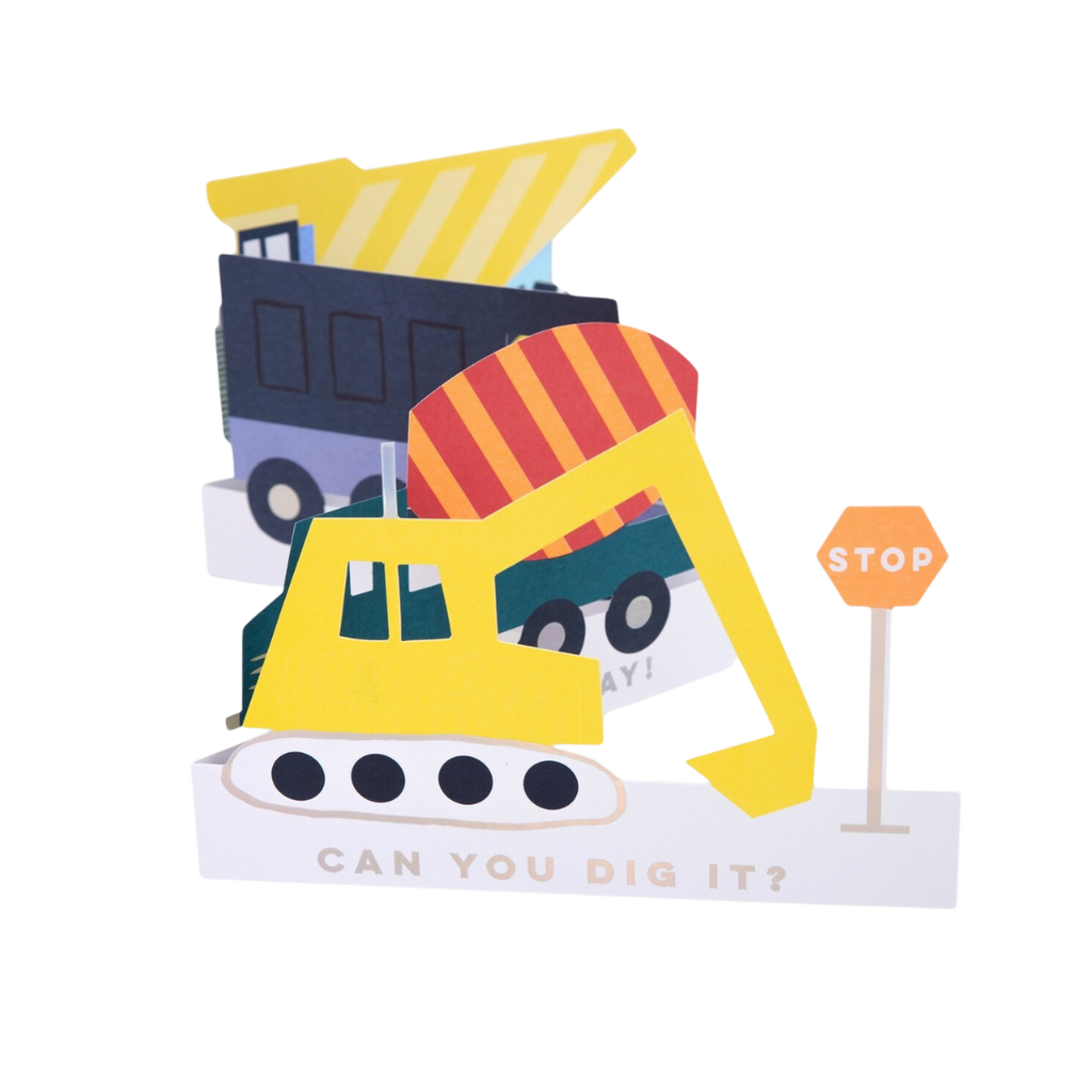 Yellow and orange construction truck cutout centerpiece with stop sign for kids birthday from Parte Haus party supply store in Bethesda Maryland