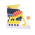Yellow and orange construction truck cutout centerpiece with stop sign for kids birthday from Parte Haus party supply store in Bethesda Maryland
