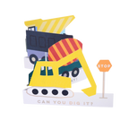 Yellow and orange construction truck cutout centerpiece with stop sign for kids birthday from Parte Haus party supply store in Bethesda Maryland
