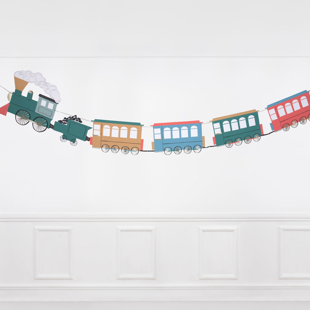 Multicolor train garland wall decoration for birthday from Parte Haus party supply store in Bethesda Maryland