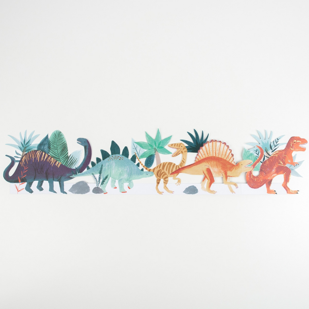 Colorful dinosaur banner with green and orange dinosaurs Jurassic birthday theme from Parte Haus party supply store in Bethesda MD.