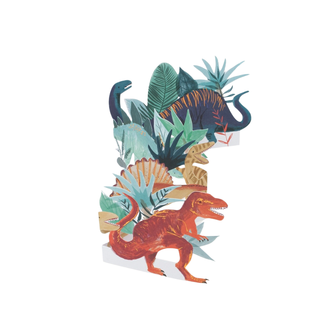 Multicolor dinosaur table centerpiece with jungle leaves for dinosaur birthday theme from Parte Haus party supply store in Bethesda Maryland