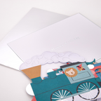 Blue train birthday card with lion and smoke design for kids birthday from Parte Haus party supply store in Bethesda Maryland