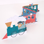 Blue and red train centerpiece with animal and balloon designs circus birthday theme from Parte Haus party supply store in Bethesda Maryland
