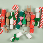 Red green and white Christmas crackers with festive designs for holiday decor from Parte Haus party supply store in Bethesda MD