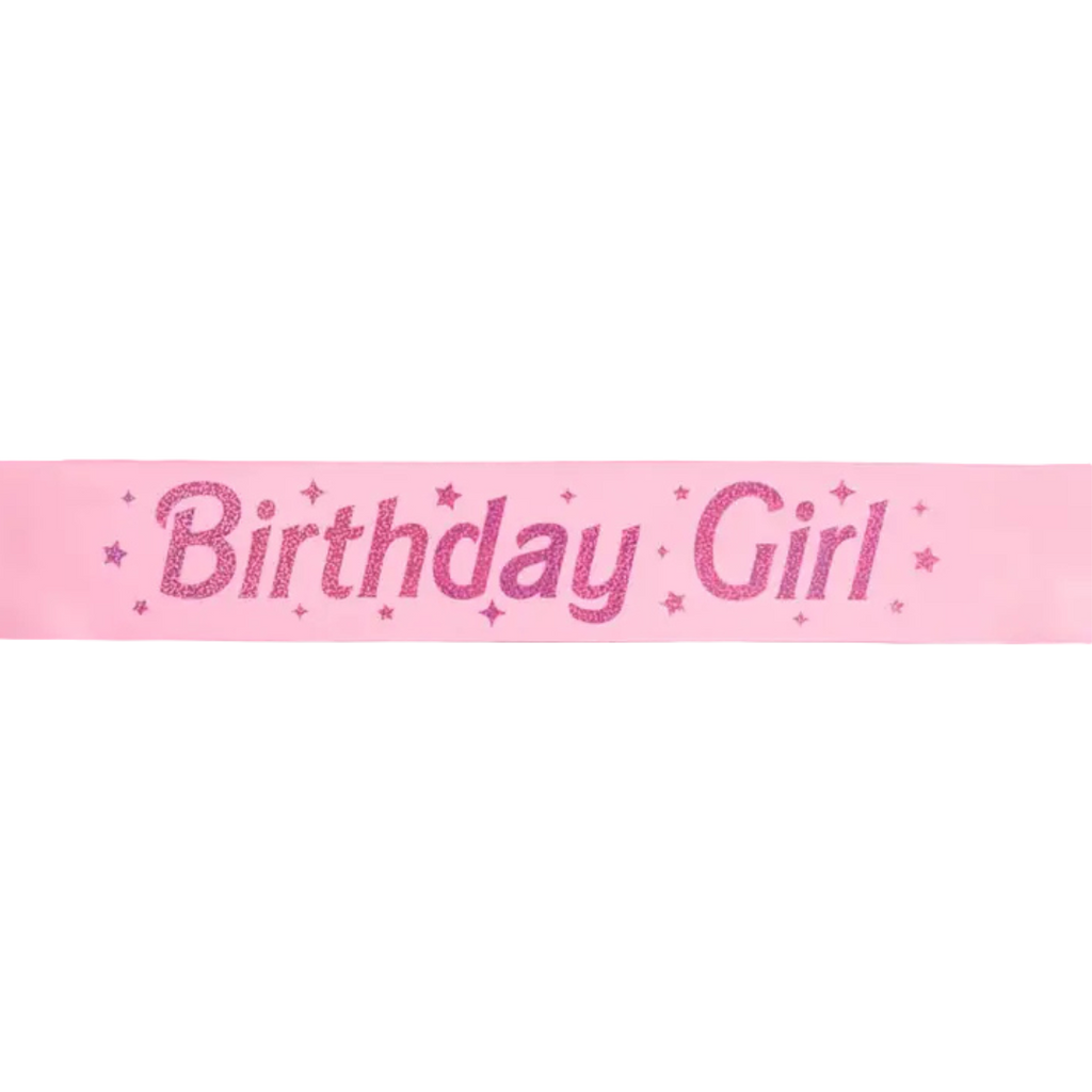 Pink Birthday Girl sash with glitter stars for birthday celebration from Parte Haus party supply store in Bethesda MD