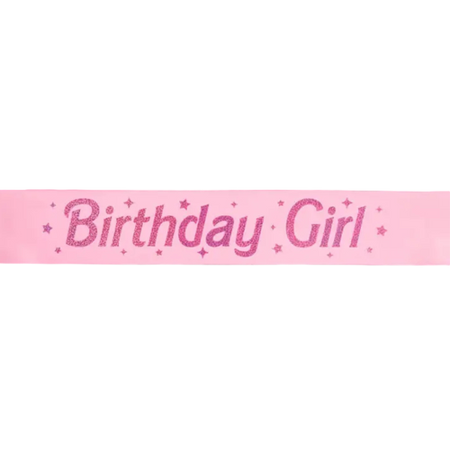 Pink Birthday Girl sash with glitter stars for birthday celebration from Parte Haus party supply store in Bethesda MD