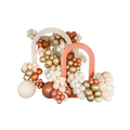Peach gold and ivory balloon arch with floral accents birthday event from Parte Haus party supply store in Bethesda MD