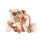 Peach gold and ivory balloon arch with floral accents birthday event from Parte Haus party supply store in Bethesda MD
