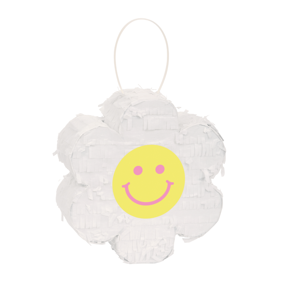 White flower pinata with yellow smiley face for birthday from Parte Haus party supply store in Bethesda MD