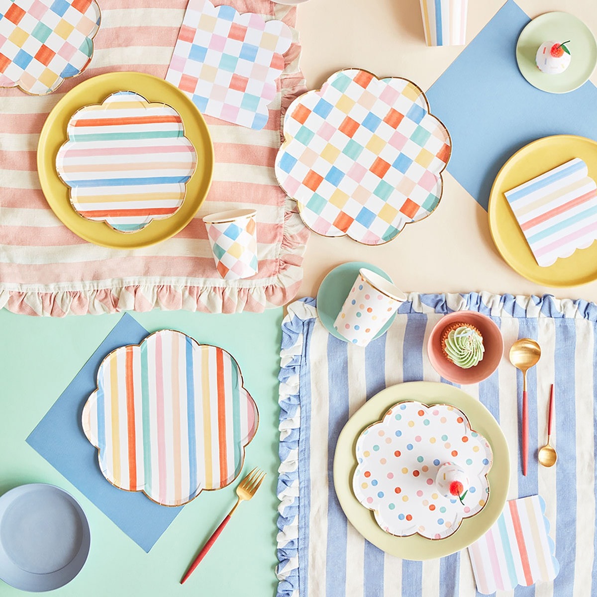 Pastel striped and polka dot plates with matching napkins and cups birthday table decor from Parte Haus party supply store in Bethesda Maryland