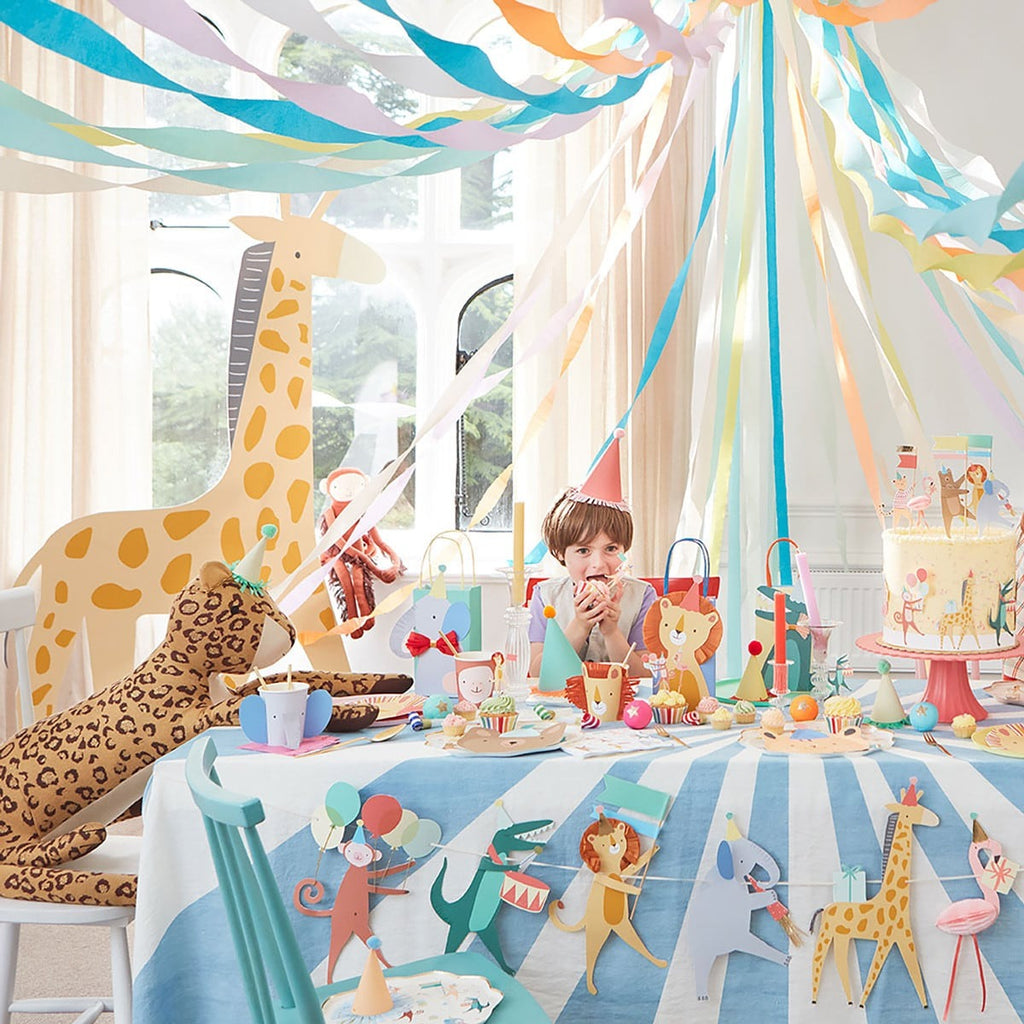 colorful animal theme birthday party table with decorations for kids from Parte Haus party supply store in Bethesda Maryland