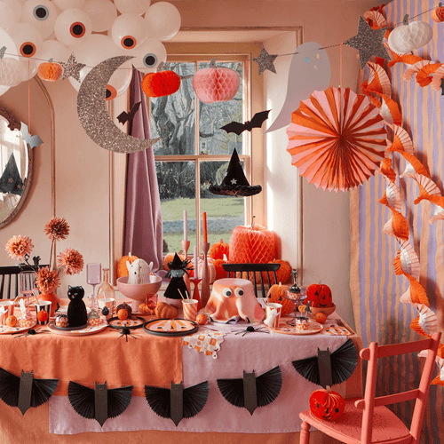 Orange and black Halloween table decorations with bats and pumpkins from Parte Haus party supply store in Bethesda Maryland