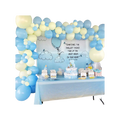 Blue and yellow balloon arch baby shower table display with backdrop from Parte Haus party supply store in Bethesda Maryland
