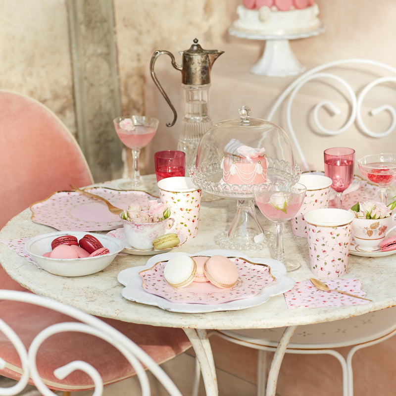Pink floral plates cups and napkins elegant tea party set with macarons for birthday from Parte Haus party supply store in Bethesda MD