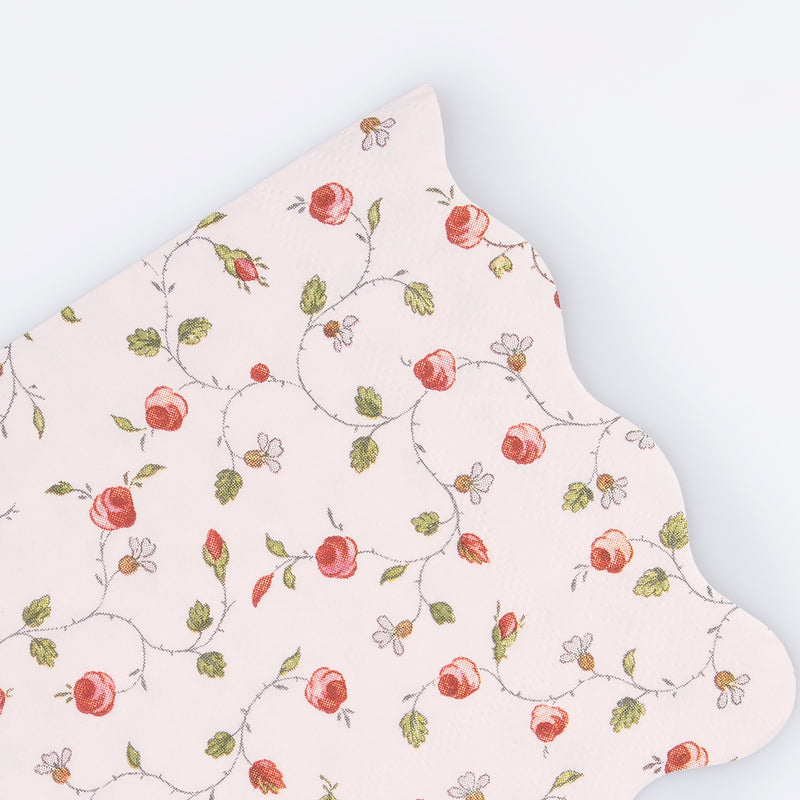 Pink floral napkin with red roses and scalloped edge for garden party from Parte Haus party supply store in Bethesda MD