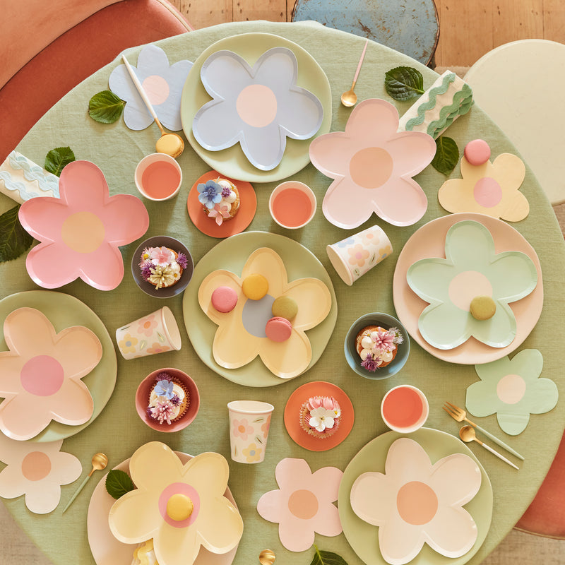 Pastel flower shaped plates and cups with floral decorations spring birthday from Parte Haus party supply store in Bethesda Maryland
