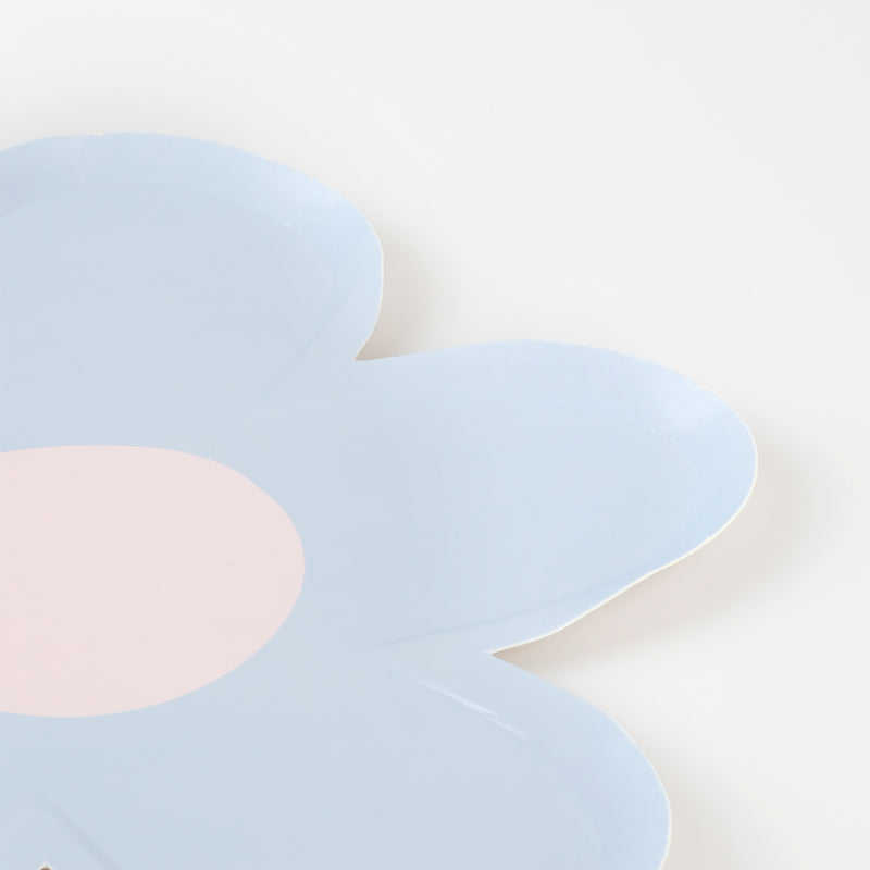 Light blue flower-shaped plate with a pink center for birthday from Parte Haus party supply store in Bethesda MD