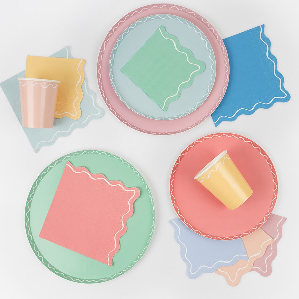 Pastel wavy edge plates cups and napkins tableware set for birthday from Parte Haus party supply store in Bethesda MD