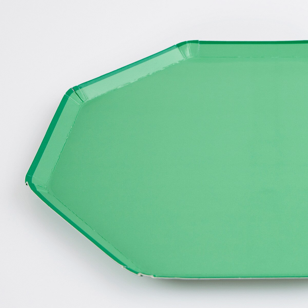 Green paper plate with octagon shape for birthday or celebration from Parte Haus party supply store in Bethesda, Maryland