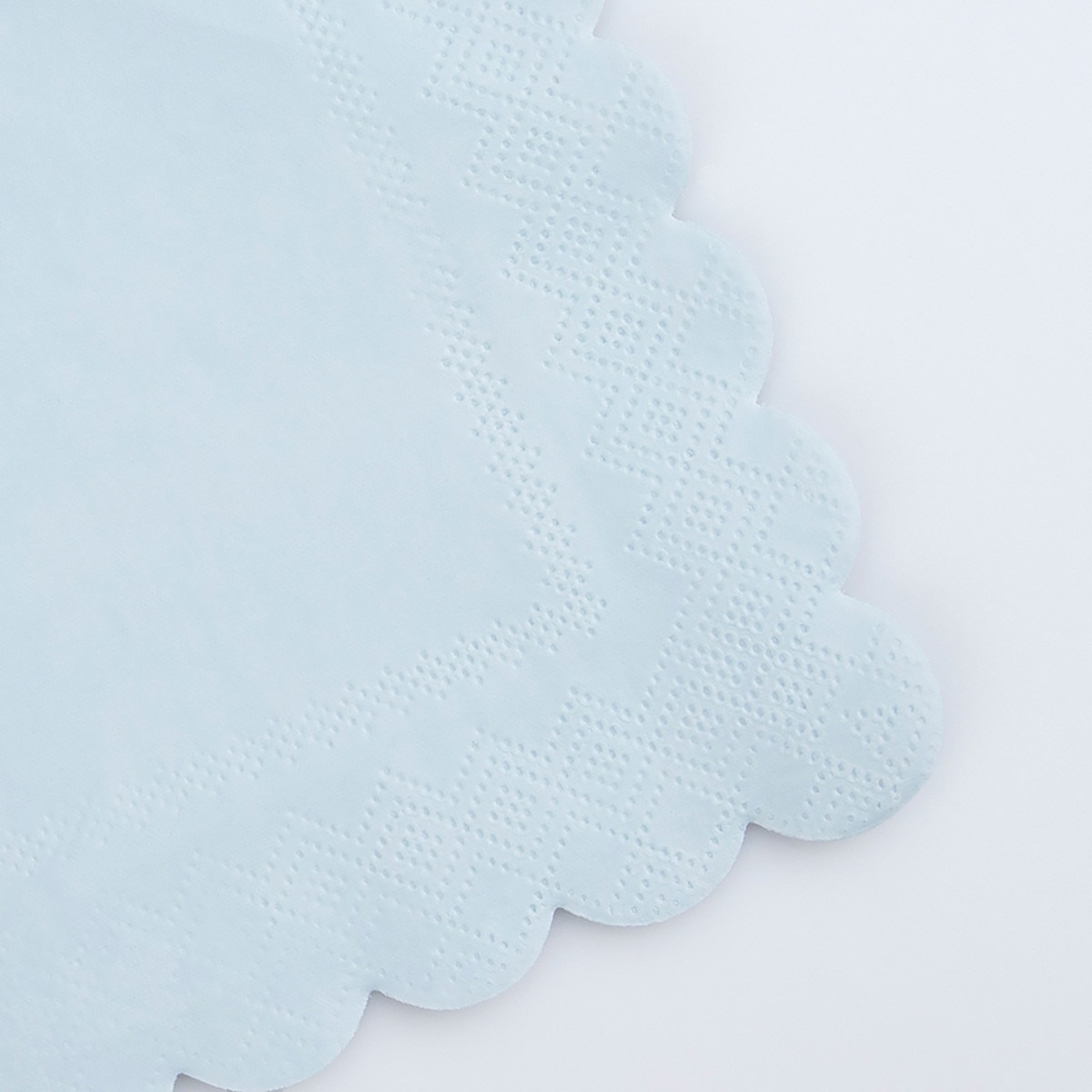 Light blue napkin with scalloped edges for birthday from Parte Haus party supply store in Bethesda MD