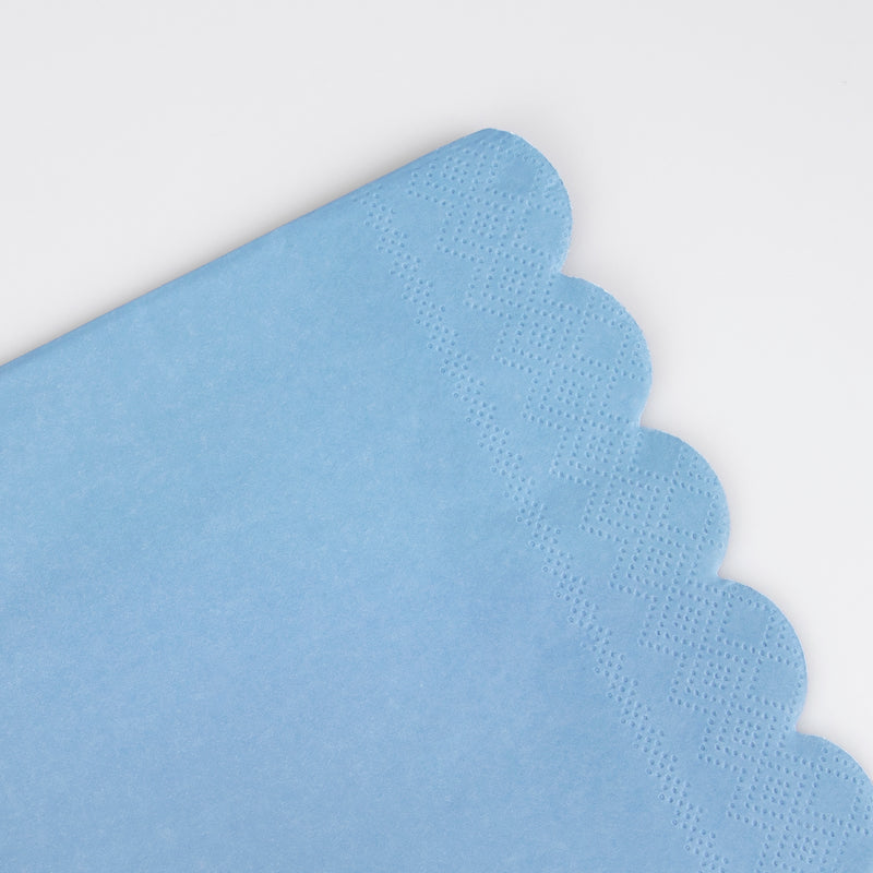 Light blue napkin with scalloped edge for birthday celebration from Parte Haus party supply store in Bethesda MD